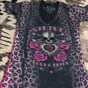 Woman's sinful shirt